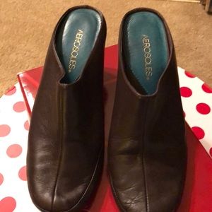 Brown wedge mule. Also available in black